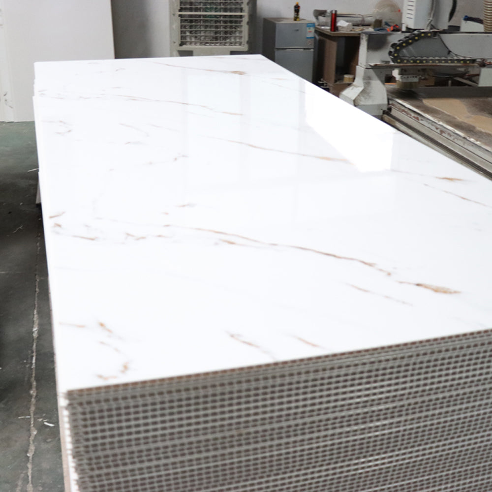 Stack of white marble-look panels with exposed end sections