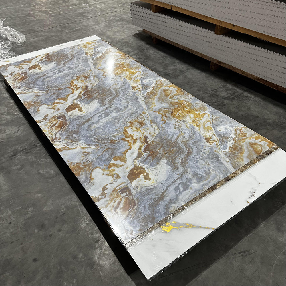Grey and gold marble-look sheet laid on supports